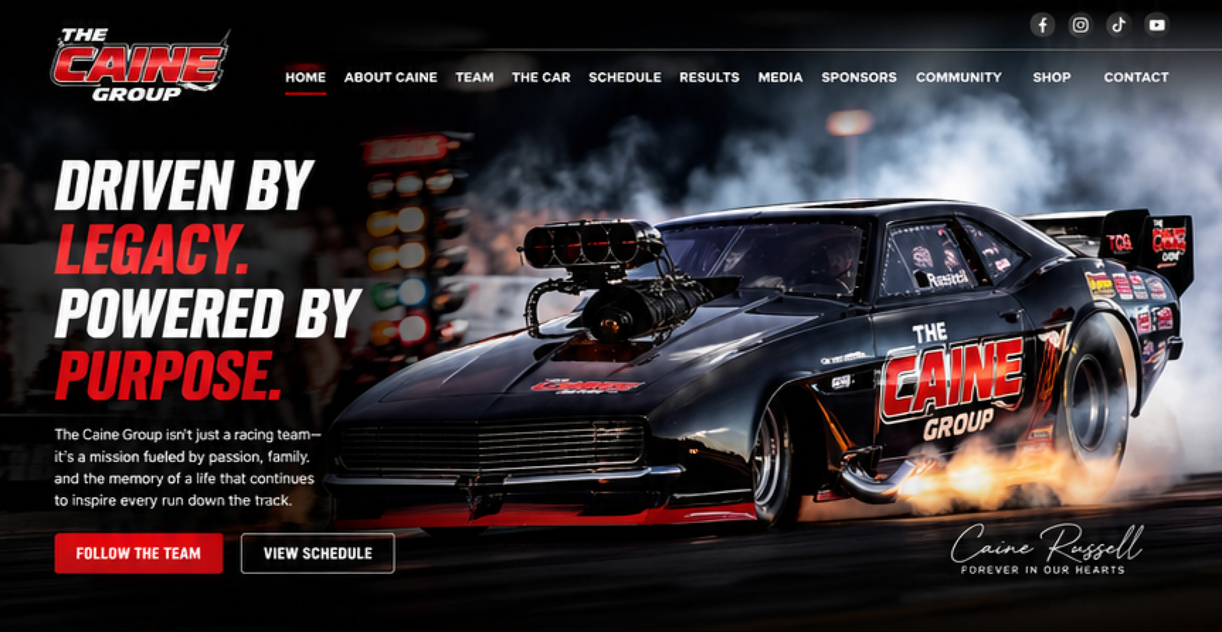 The Caine Group Funny Car launching through smoke and fire