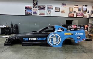 The Caine Group Funny Car on track