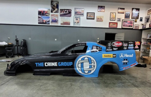 The Caine Group race car side panel